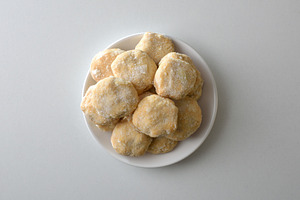 Stack of sugar cookies on plate isolated in the center, a Food & Drink Photo by Davizro's Market