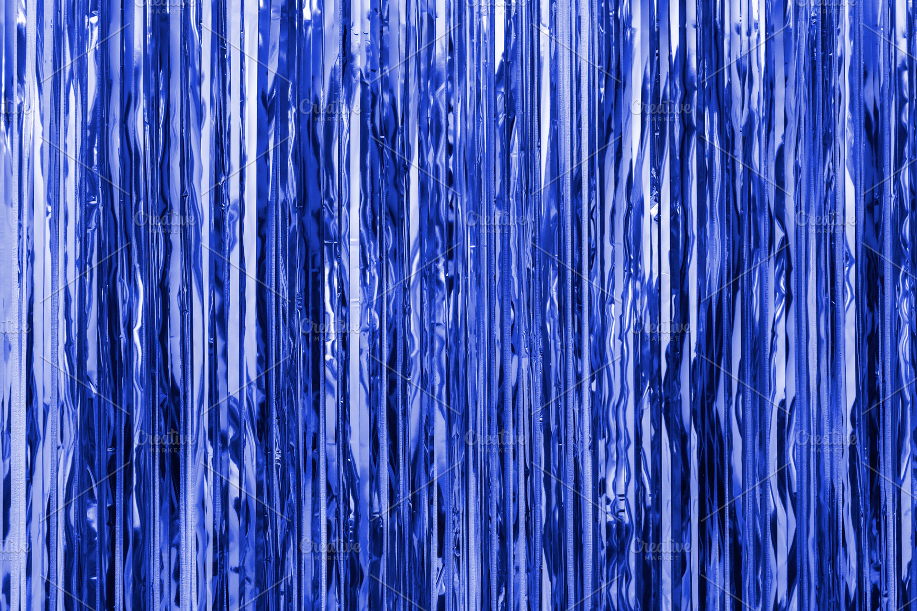Blue foil strip background. Curtain, a Background Photo by Kolomiyets Viktoriya