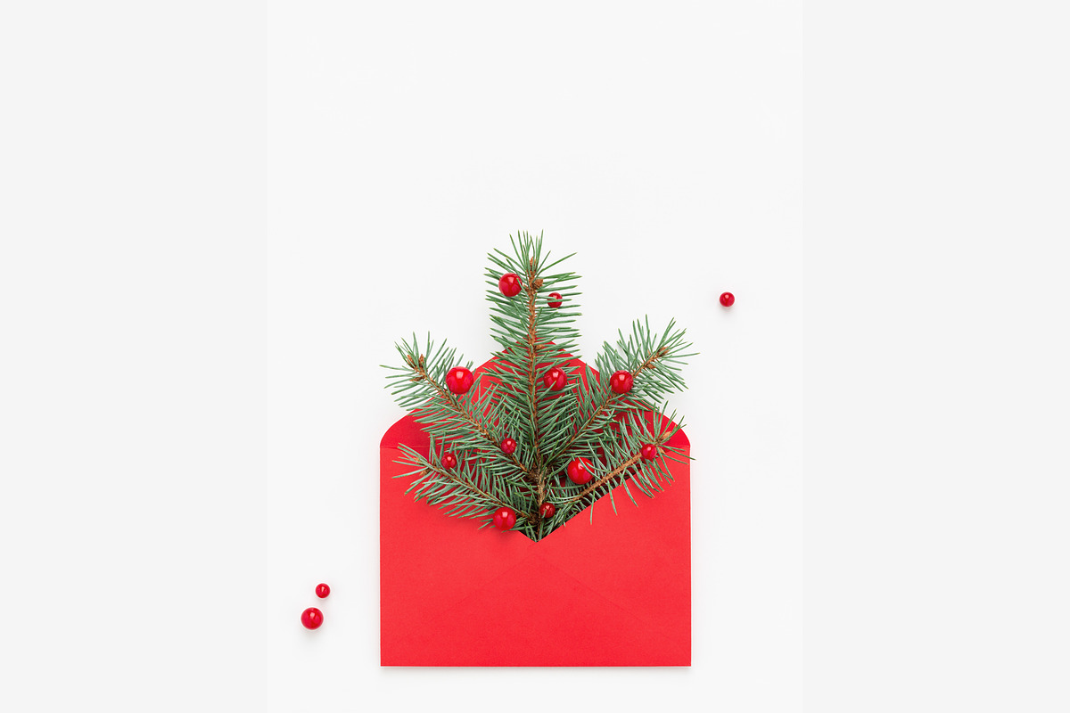 Christmas tree symbol in red envelop featuring christmas tree, envelope, and, a Holiday Photo by Julia Manga (Photo 1 of 2)