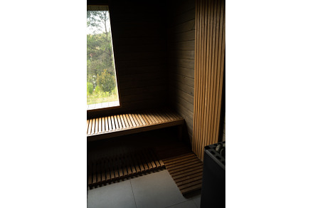 Wooden sauna bench with vertical