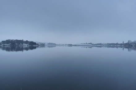 Frozen lake featuring frozen, lake, and winter