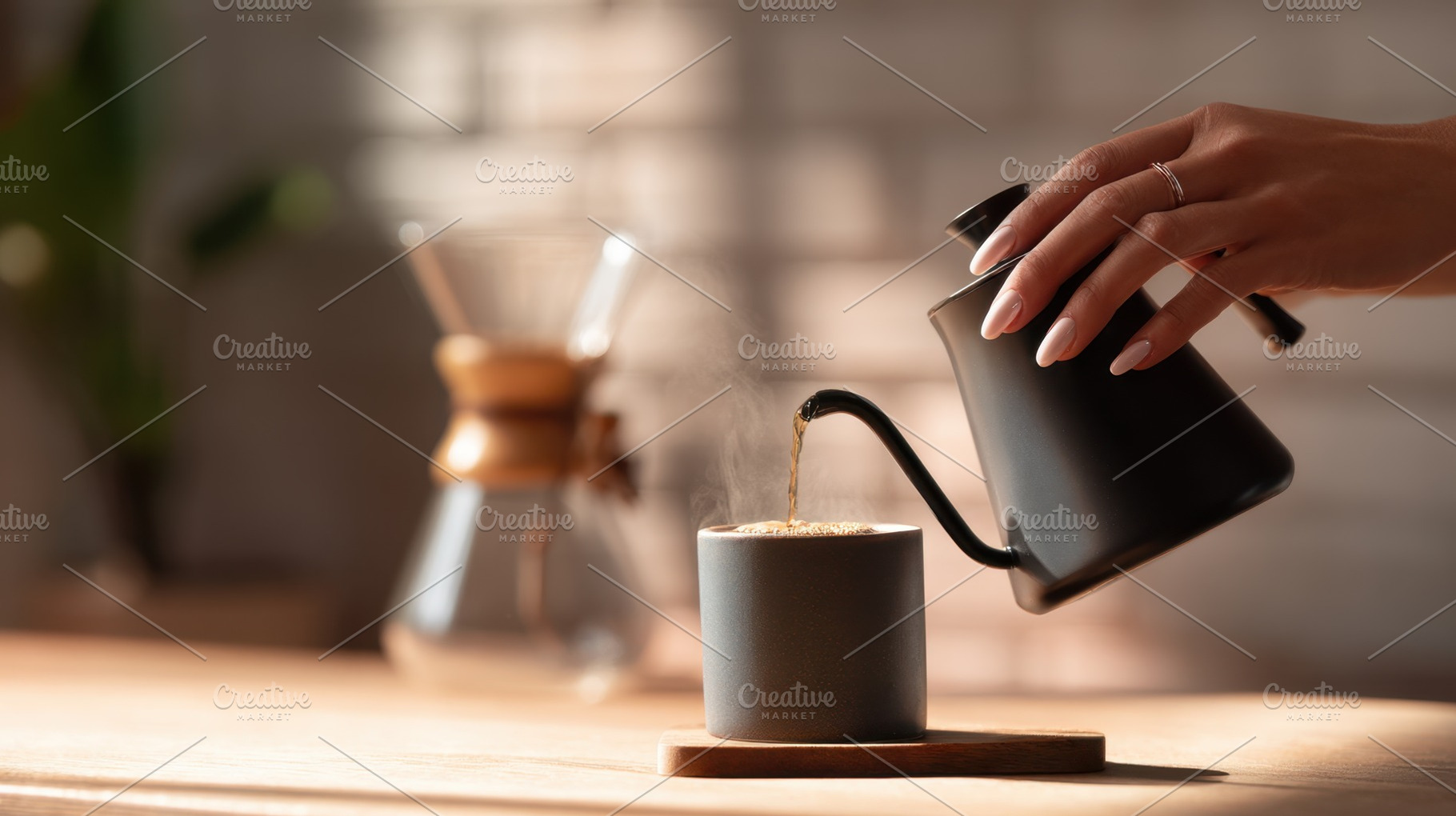 Pouring water into a coffee cup, a Photo by Beautiful things