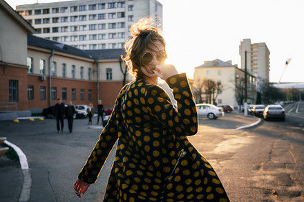 Attractive young woman turns around, a Person Photo by bortnikauphoto