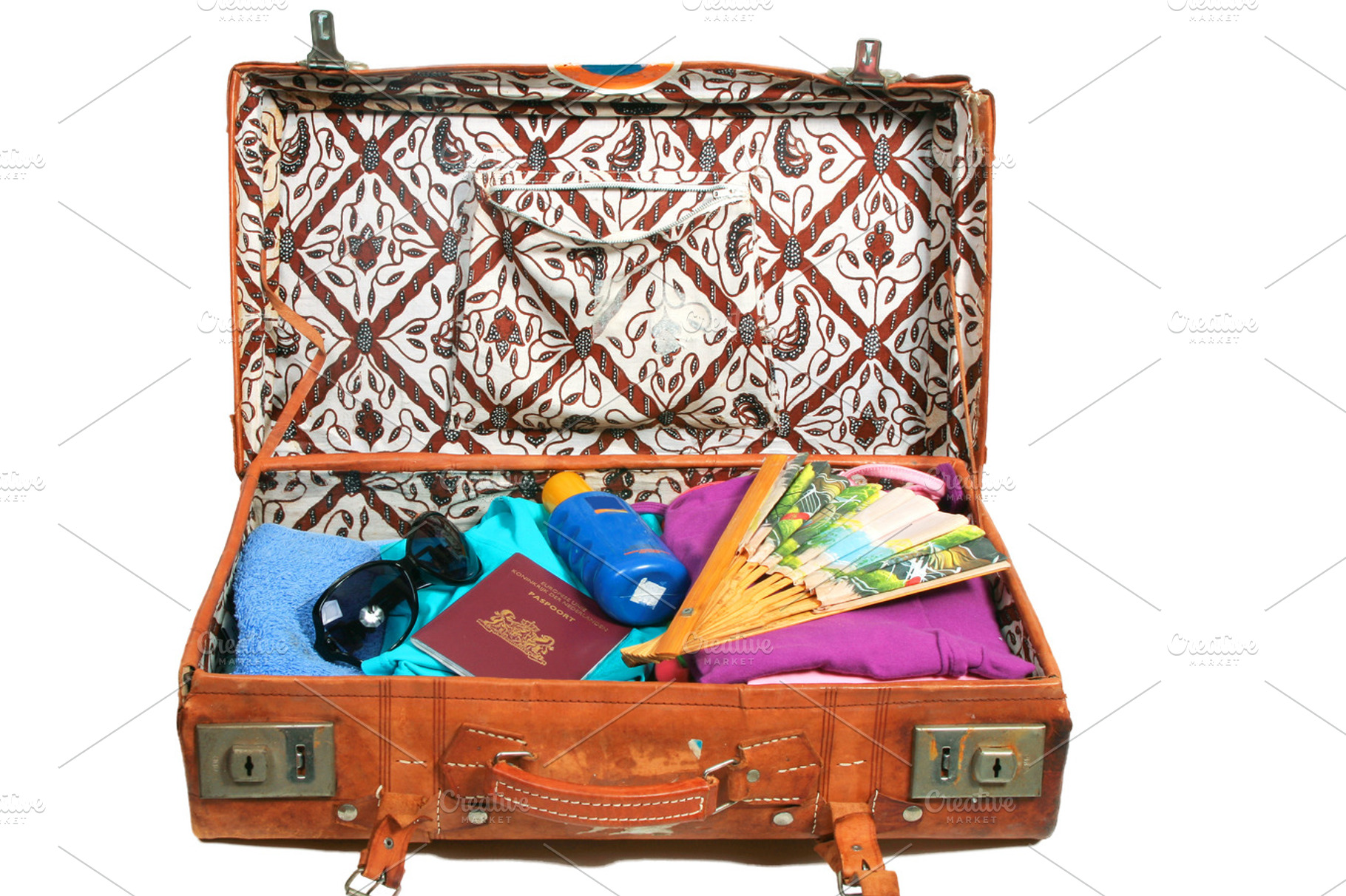 Packed suitcase for a beach vacation stock photo containing luggage and beach