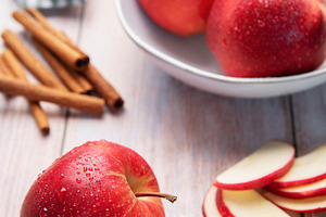 Fresh apples and cinnamon preparing for baking, a Food & Drink Photo by Olena Rudo