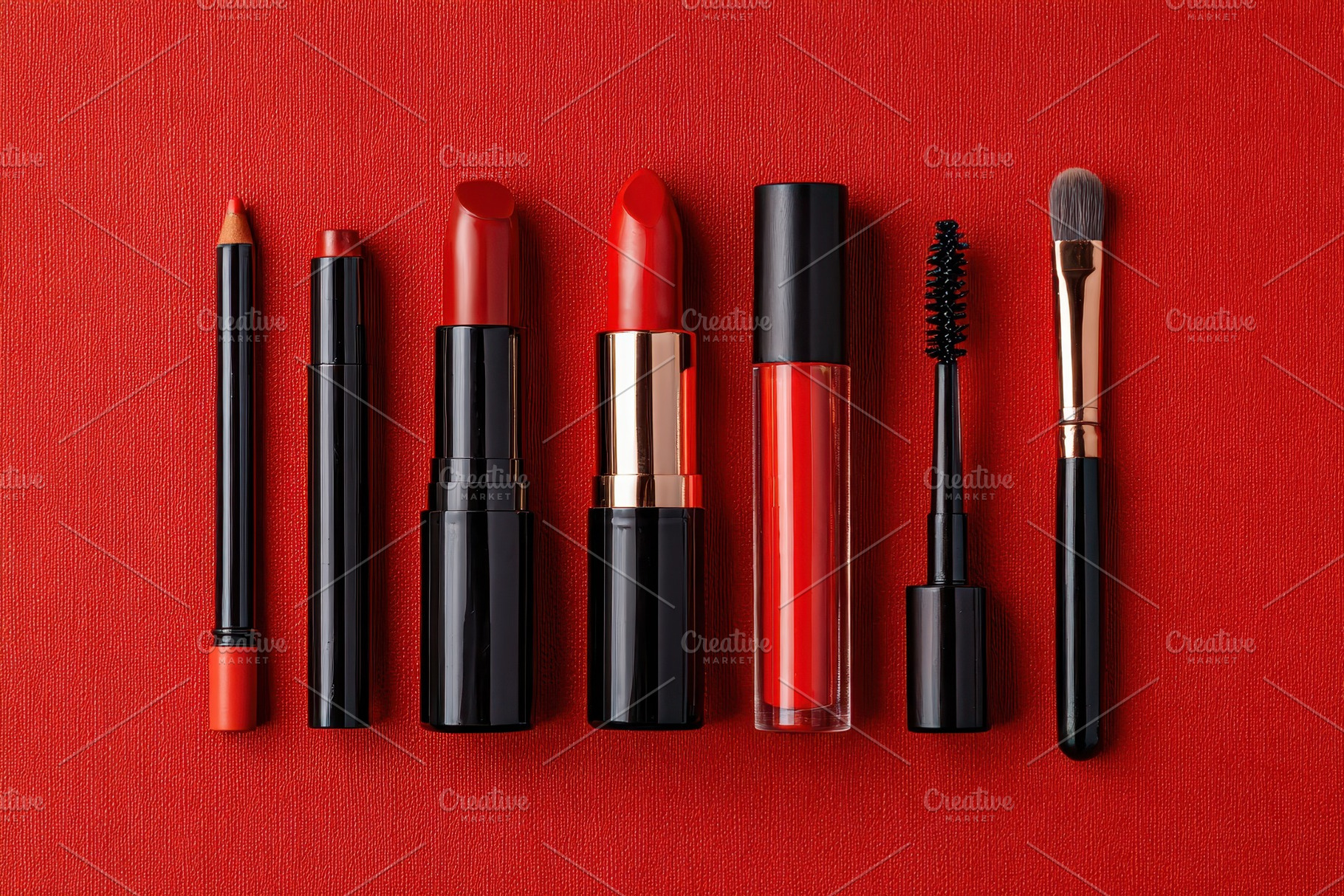 Arrangement of various red cosmetics, a Photo by Pavel_design