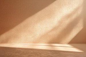 Empty beige room with textured walls and dramatic sunlight casti, an Abstract Photo by José Manuel Gelpi