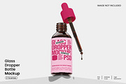 Glass Dropper Bottle Mockup, a Packaging Mockup by Unerispace (Thumbnail 1 of 4)