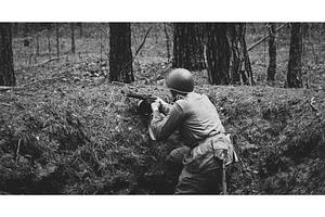 Black and White Soldier Aiming in, a Person Photo by Our Amazing World