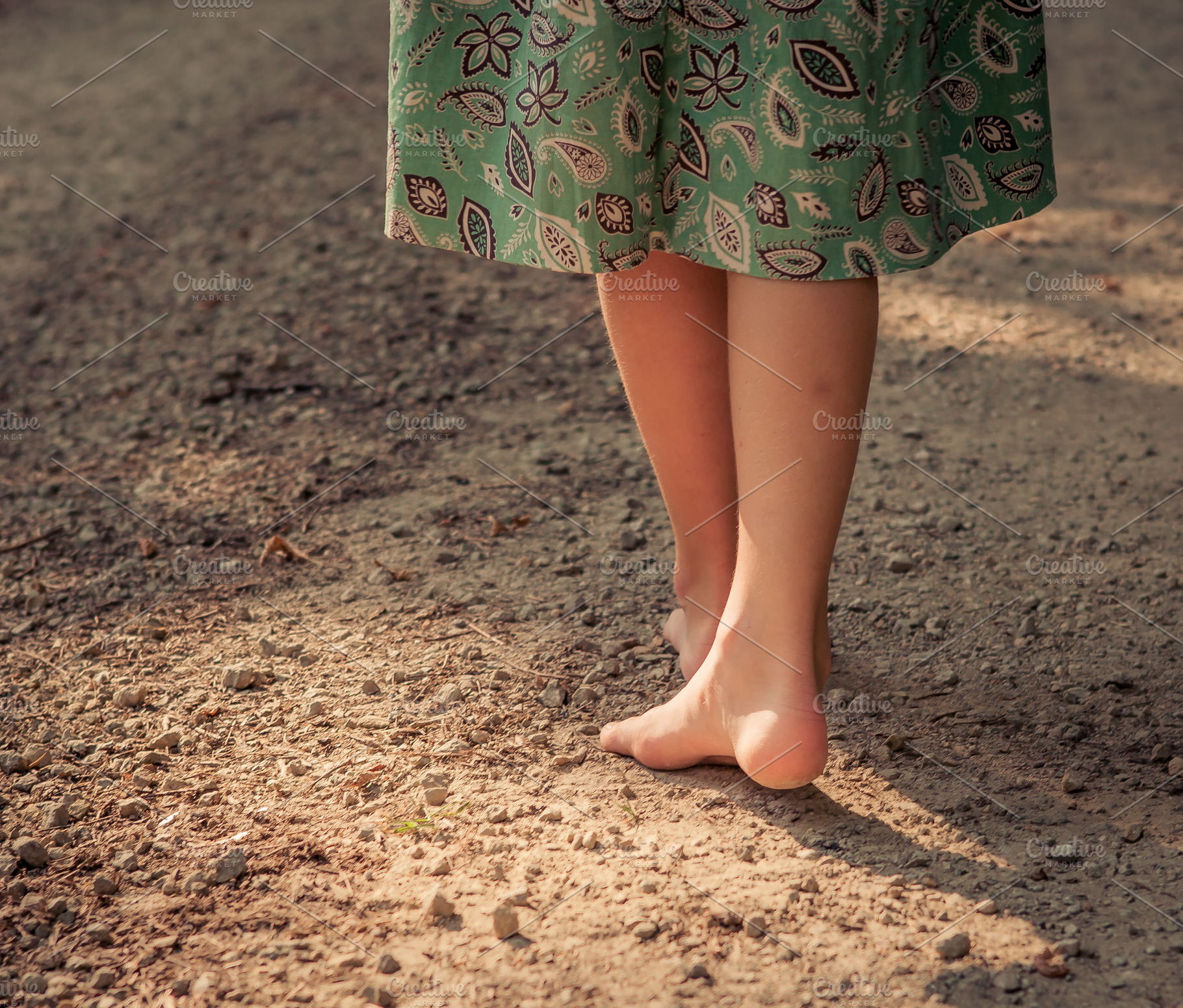 Young Girl Walks Barefoot on Road, a Person Photo by Barbara's iCandy