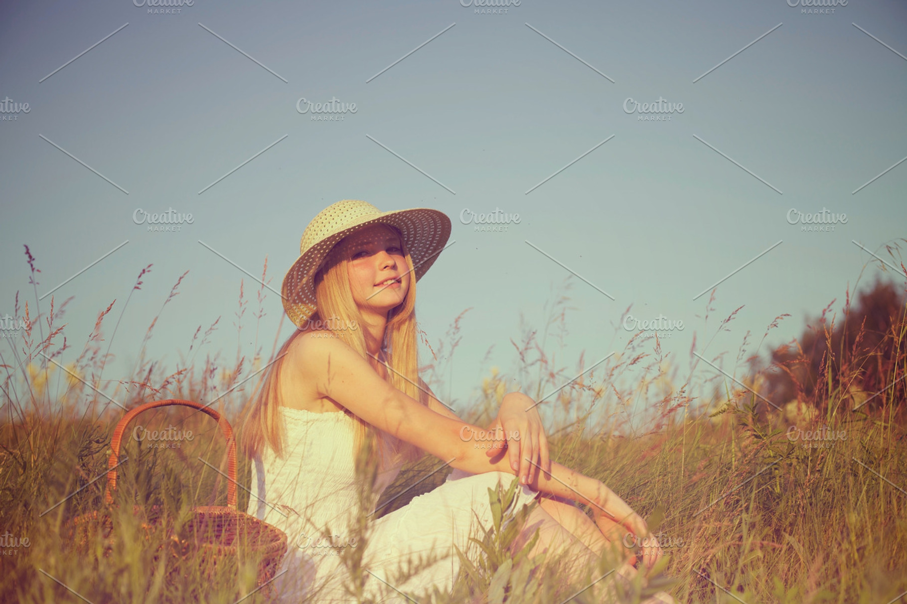 Girl resting on meadow