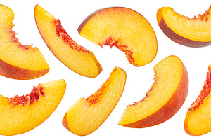 Peach slices isolated on white, a Photo by Max Lashcheuski