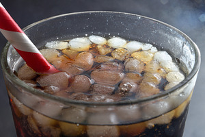 Glass with refreshing drink with ice elevated view, a Food & Drink Photo by Davizro's Market