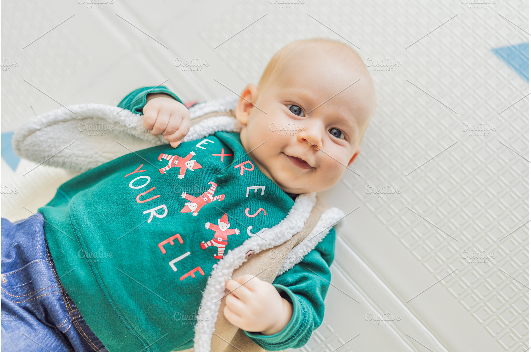 Adorable baby dressed in a Christmas, a Holiday Photo by Elizaveta Galitskaya