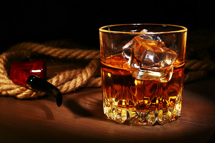 Glass with whiskey ice cubes and featuring whiskey, whisky, and cognac, a Food & Drink Photo by Vi Style
