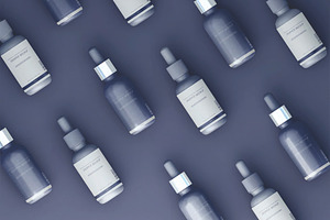 Dropper Bottles Mockup, an Advertising Mockup by skybluecreative