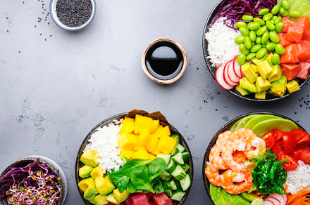 Poke bowl set with  tuna, salmon, shrimp with avocado, mango, ra, a Food & Drink Photo by 5PH