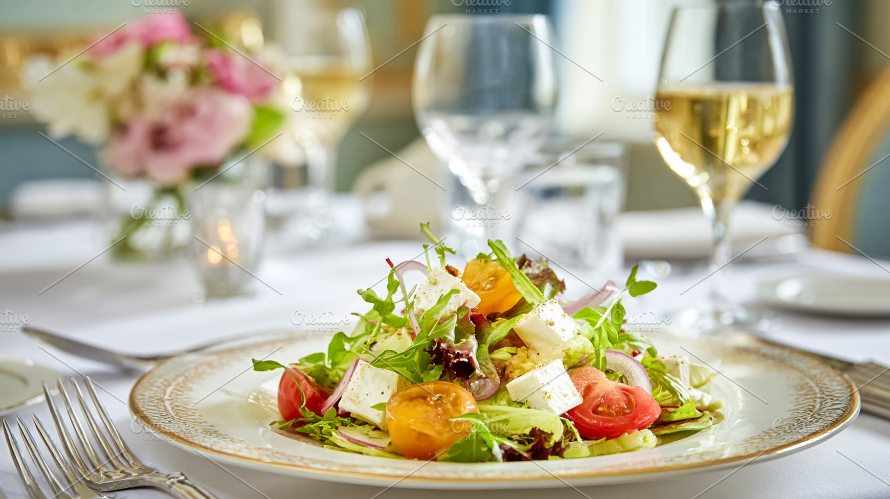Fresh gourmet salad with feta cheese, cherry tomatoes, and arugu, a Food & Drink Photo by Studio ANNA