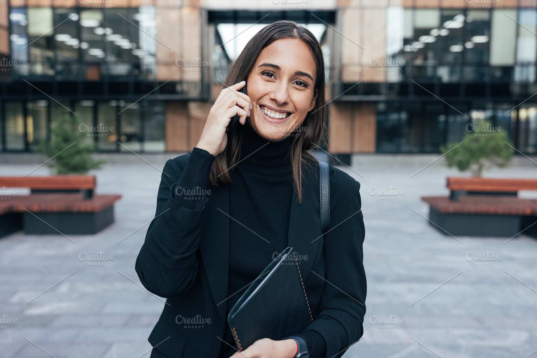 Portrait of a smiling woman employee, a Business Photo by Artem Varnitsin