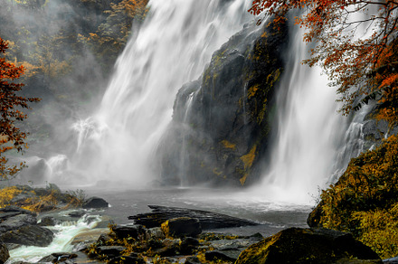 Waterfall in colorful autumn forest stock photo containing waterfall and