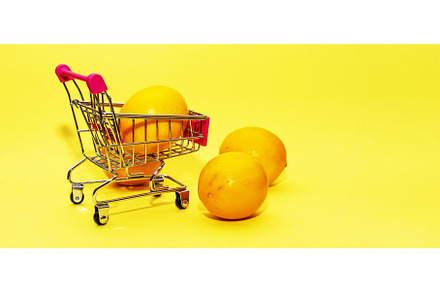 Oranges in an iron grocery cart on a, a Food & Drink Photo by shahin.mammadov