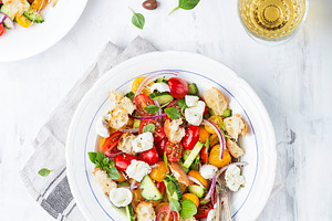 Italian traditional salad panzanella containing antipasto, appetizer, and