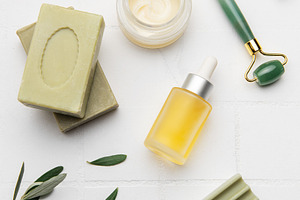 Natural olive oil soap, cream, serum and green jade roller creat, a Health & Medical Photo by Olena Rudo
