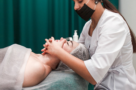 Doctor beautician makes cosmetic, a Photo by borodai94