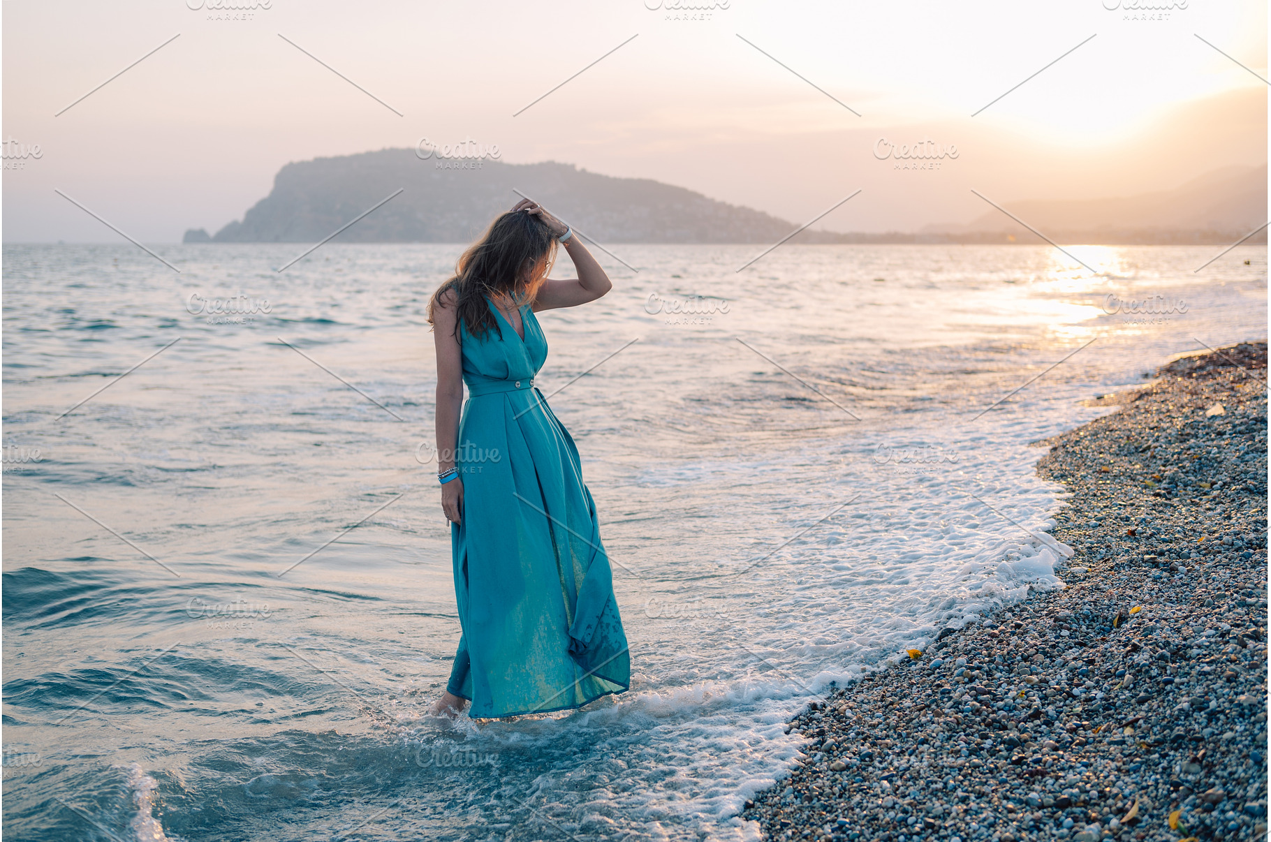 Woman in Flowing Dress on Seaside, a Person Photo by Jan Jack Russo Media