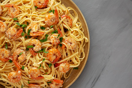 Baked Shrimp Scampi Linguine Pasta with Parsley on a Plate, top, a Food & Drink Photo by LiudmylaChuhunova