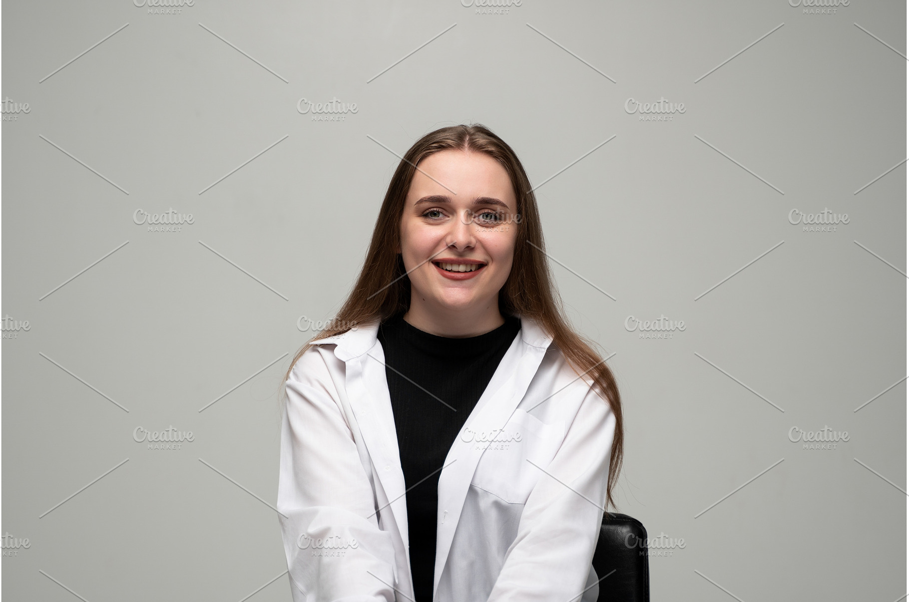 Young adult woman smiling, a Person Photo by volodymyrshtun13795