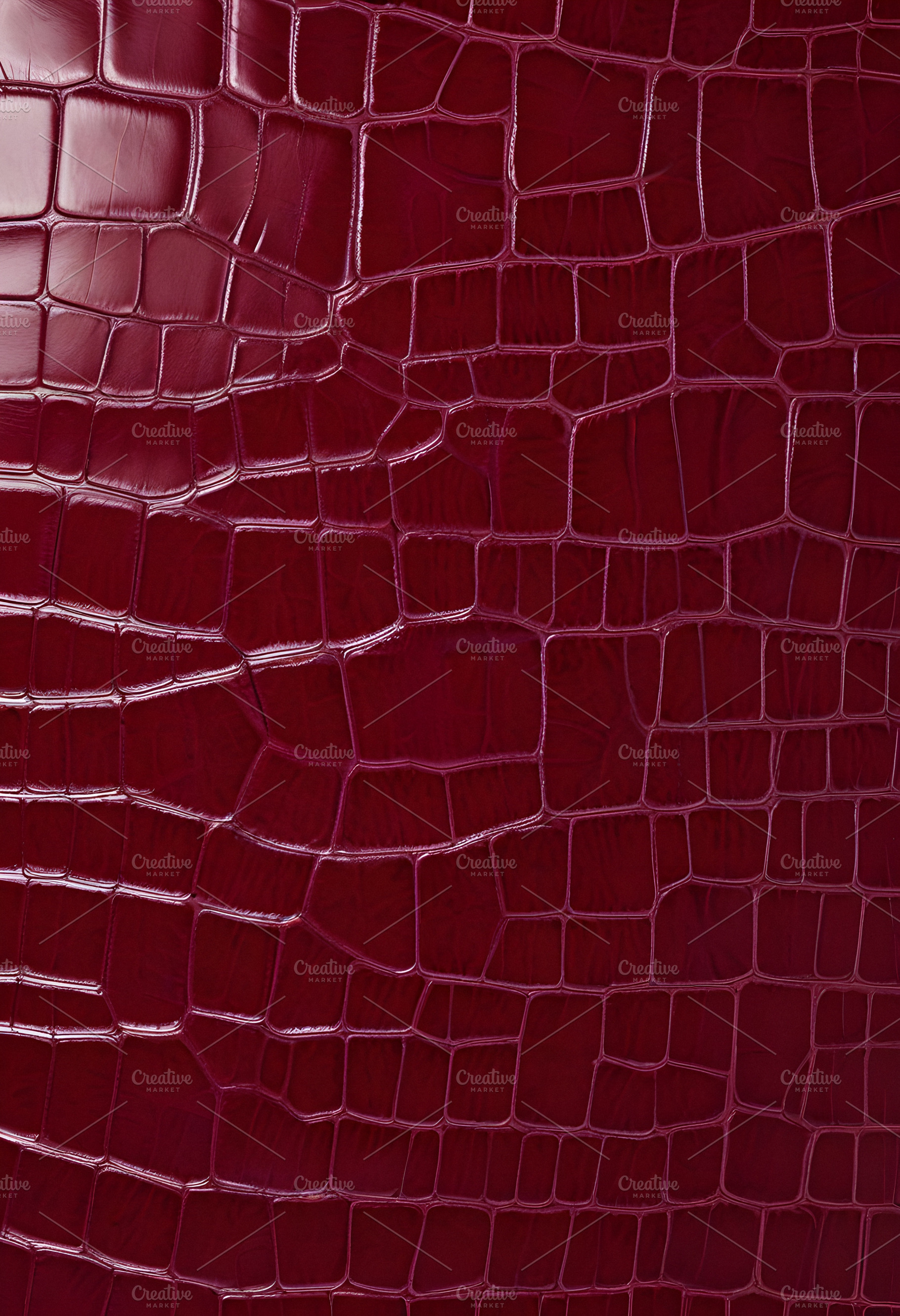 Rich burgundy crocodile leather texture with intricate patterns showcasing luxu, a Background Photo by Kzara Visual Concepts
