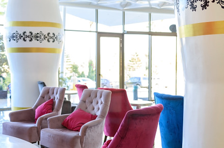 a variety of modern style sofas in the lobby of a Turkish hotel, an Architecture Photo by TanaCh