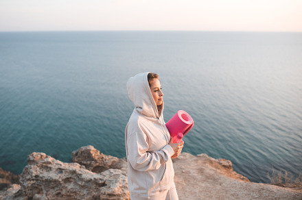 Woman practive yoga over sea, a Sports & Recreation Photo by morrowlight