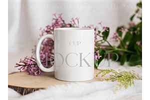White Cup with Spring Flowers, a Product Mockup by MockupWizard