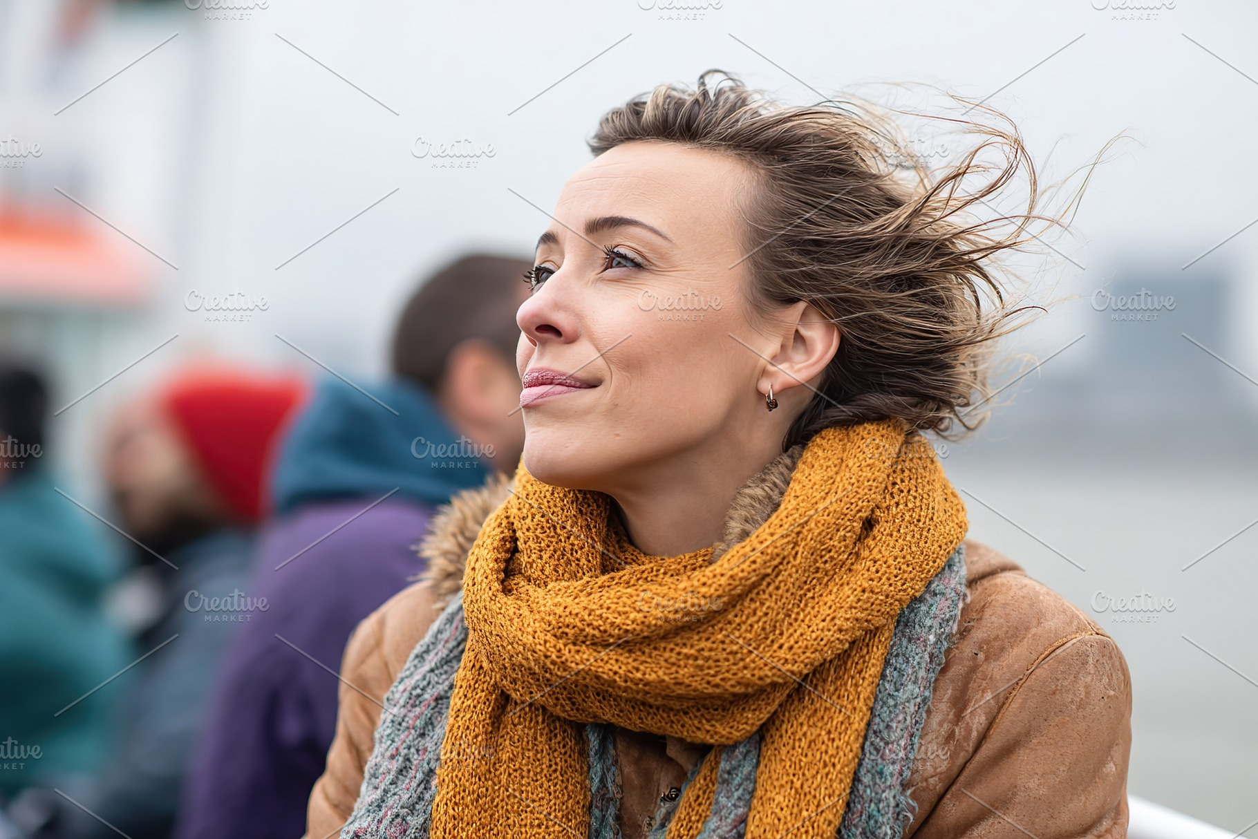 Enjoying a boat tour on a breezy day with hair blown by the wind, a Person Photo by AlyaAnd