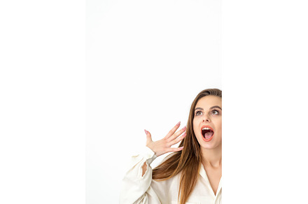 Shocked young caucasian woman with, a Person Photo by okskukuruza