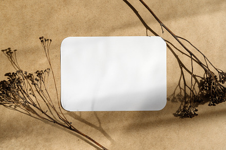 Blank paper sheet on a kraft paper featuring card, paper, and business, an Arts & Entertainment Photo by Edalin's Store