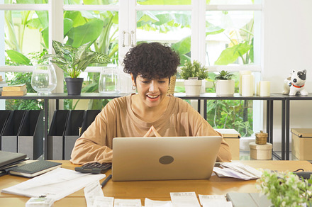 Business Asian american woman, person working from home, talking, a Photo by Tampatra