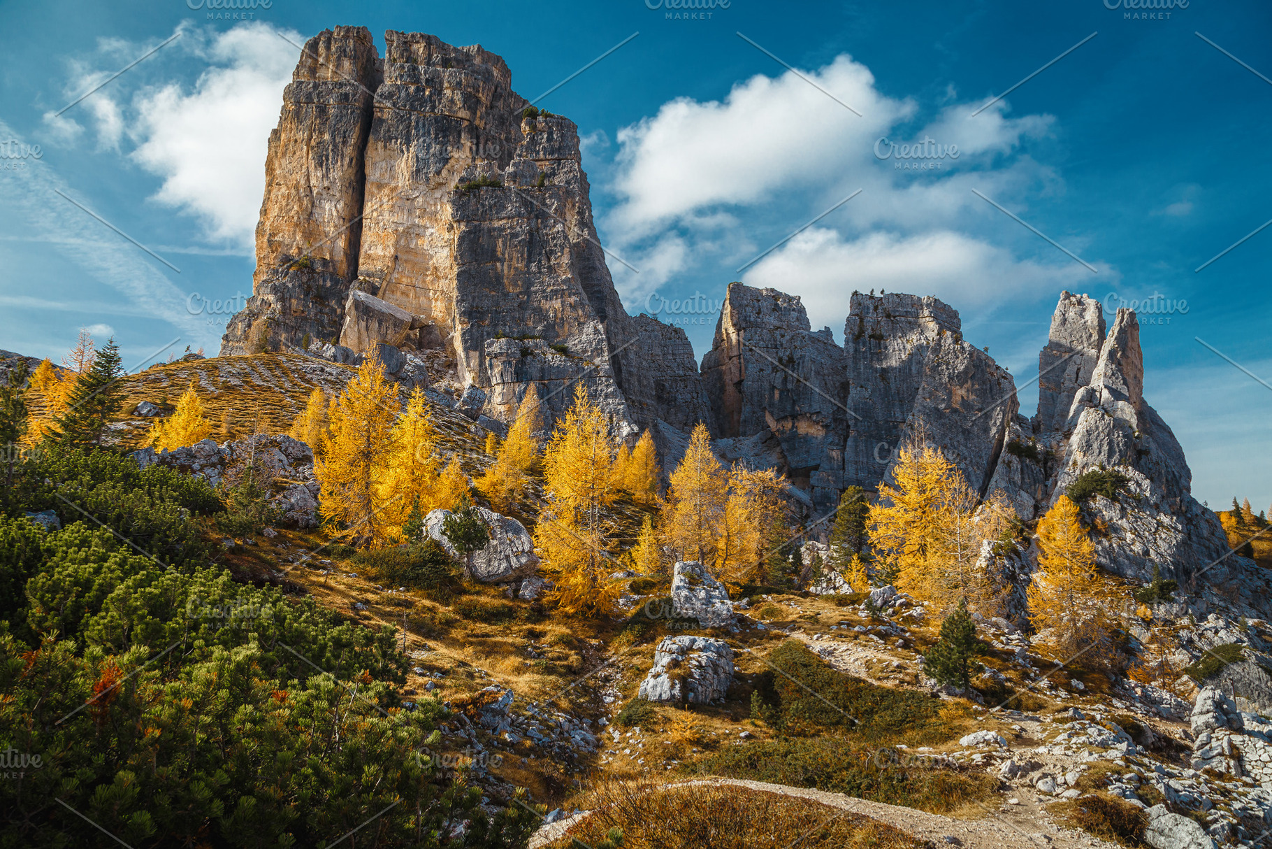 Cinque Torri cliffs at autumn, a Nature Photo by Alpine Dreams