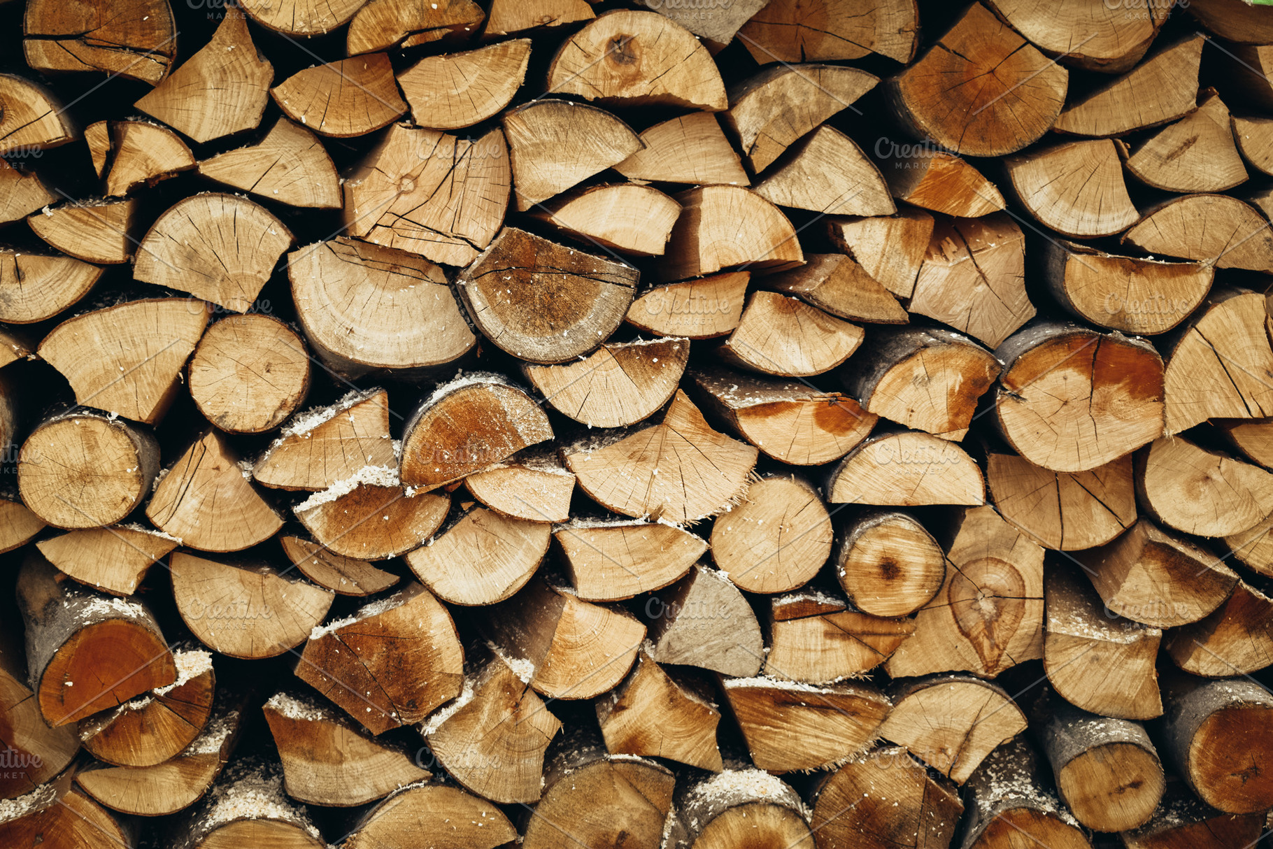 Firewoods in the pile close-up, a Nature Photo by Three Design
