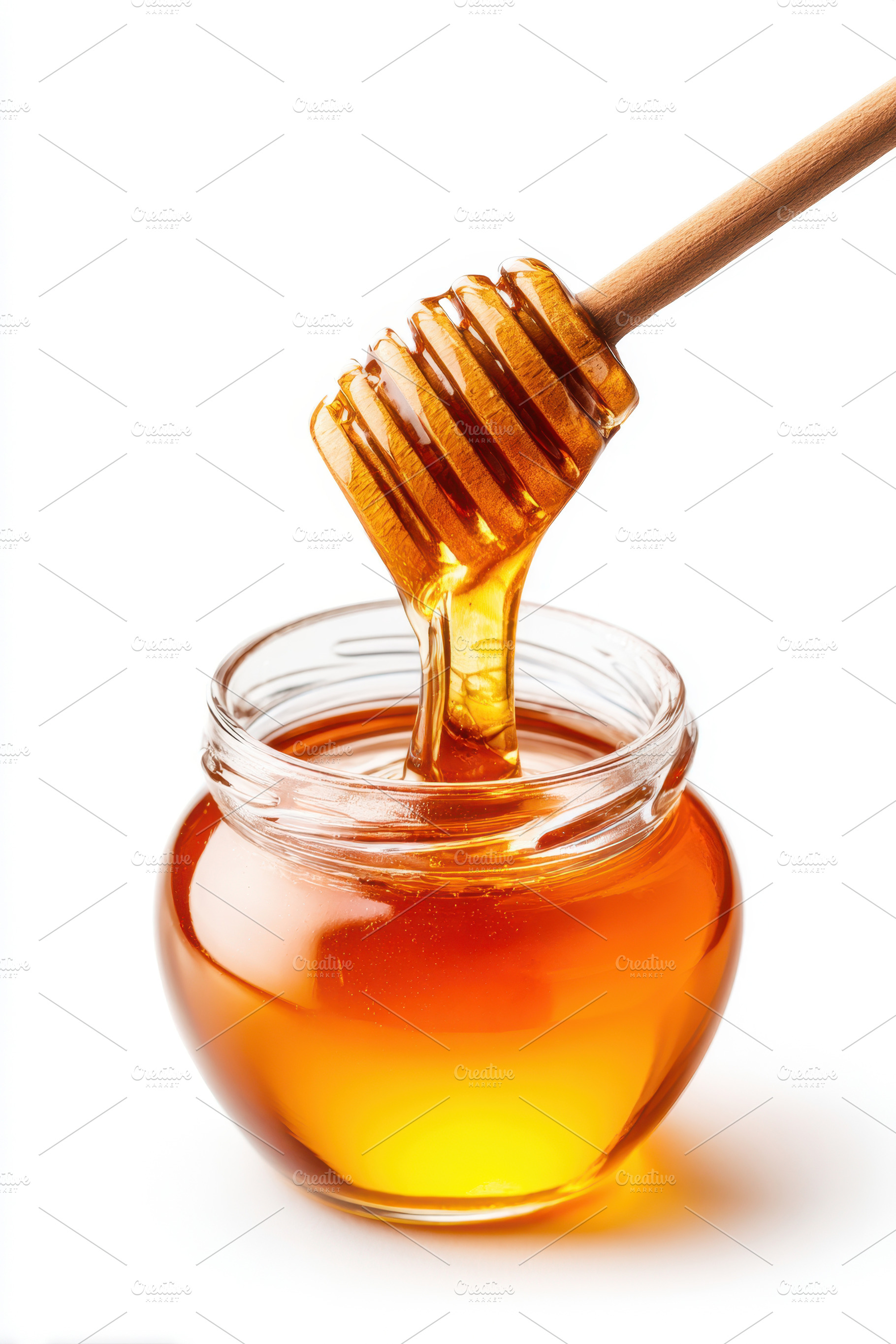 Honey jar with wooden dipper, a Food & Drink Photo by AlyaAnd