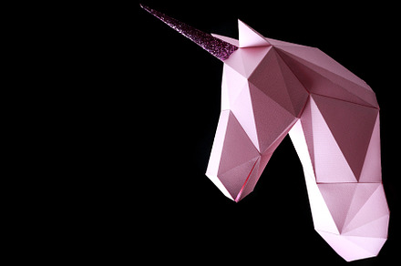 Pink unicorn on a black background. 