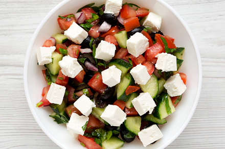 Homemade Shepards salad with cucumbers, feta and parsley in a wh, a Food & Drink Photo by LiudmylaChuhunova