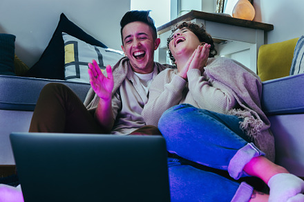 Cozy couple enjoying their favourite show together, a Person Photo by Jacob Lund