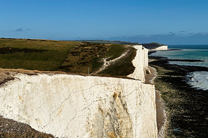 Spectacular white chalk cliffs along Seven Sisters Cliffs coastline in East Sus, a Nature Photo by AS photostudio