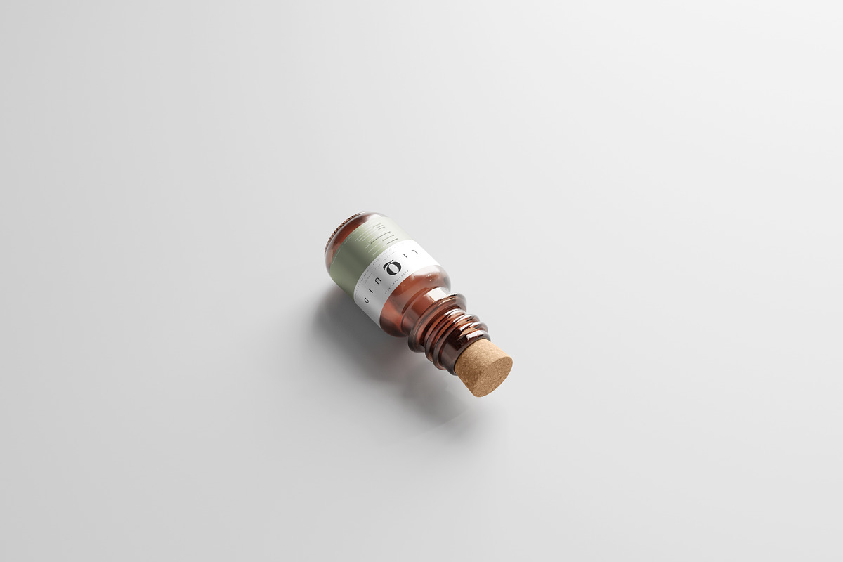 Amber Glass Bottle With Cork Mockup, a Cups & Container Mockup by pmvch (Photo 3 of 10)
