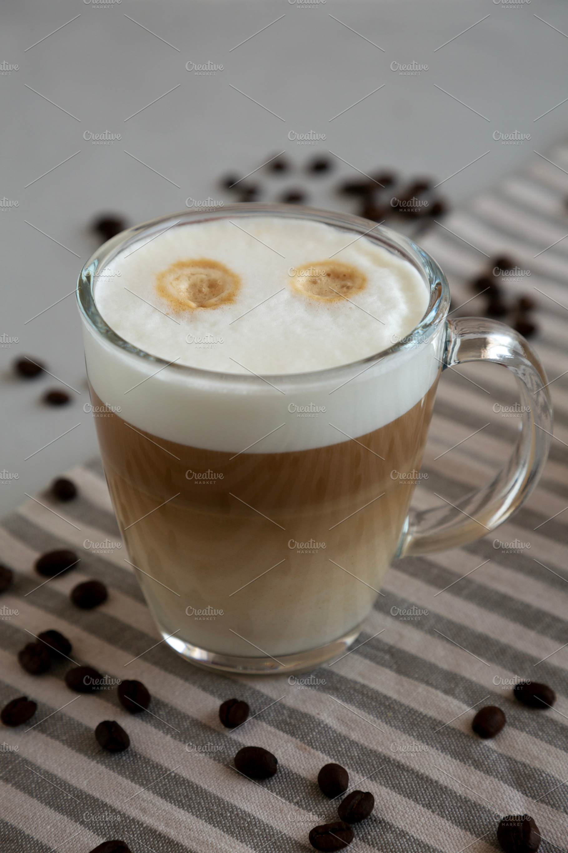Homemade Latte Macchiato in Glasses, side view., a Food & Drink Photo by LiudmylaChuhunova