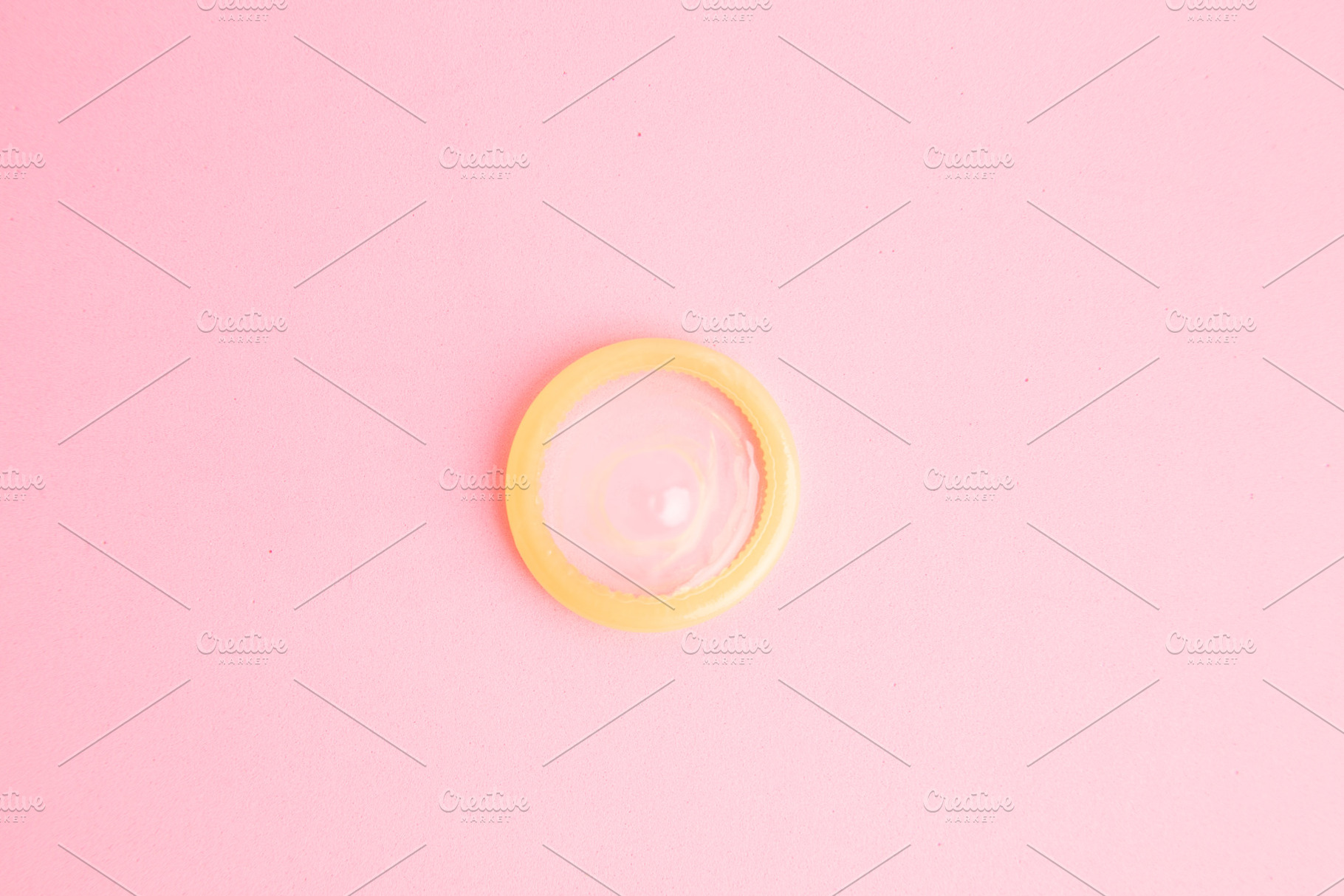 condom in colorful background, a Background Photo by robcar