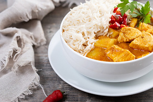 Massaman curry in bowl on wooden table. Traditional Thai food re, a Food & Drink Photo by etorres69